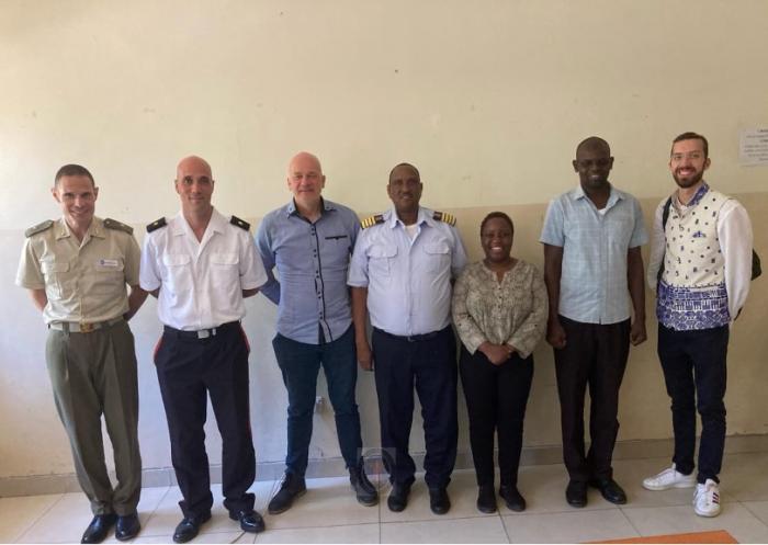 EUNAVFOR ATALANTA delegation and Kenya Coast Guard Service personnel.