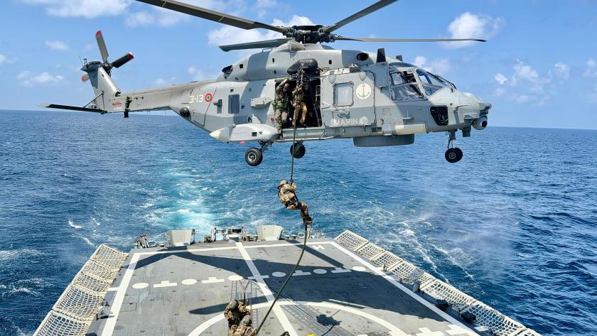 Italian Navy SH90 and Brigade San Marco troops on a fast rope manoeuvre on ESP CANARIAS flight deck